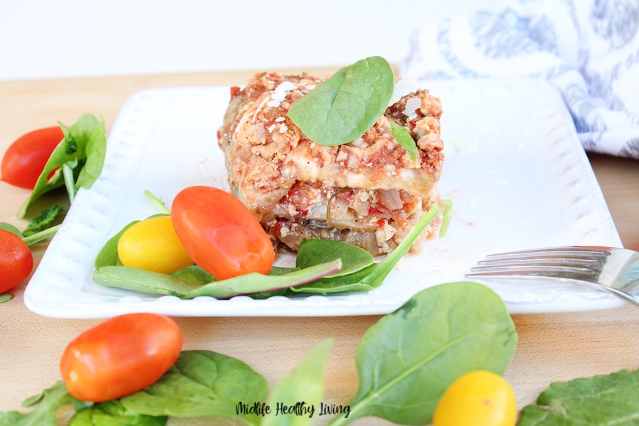 A slice of the finished weight watchers eggplant lasagna on a plate ready to eat. 