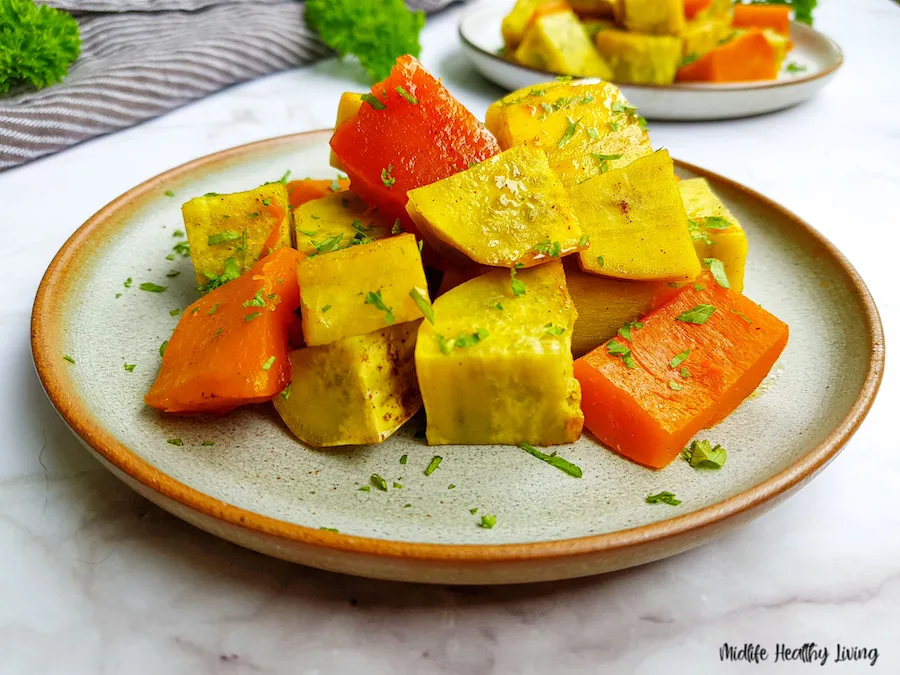 A close up view of the finished weight watchers roasted sweet potatoes ready to serve.