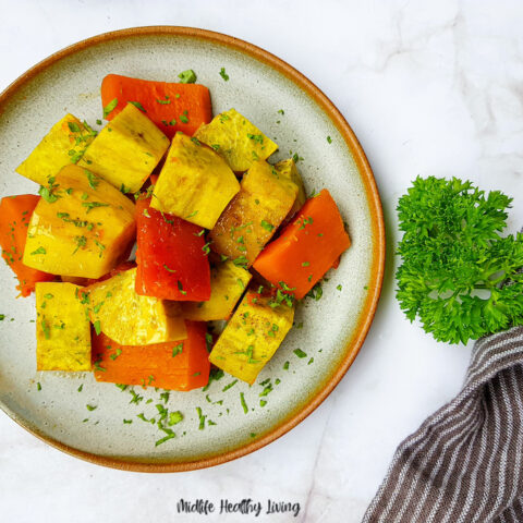 Featured image showing a plate of the finished weight watchers roasted sweet potatoes ready to serve.