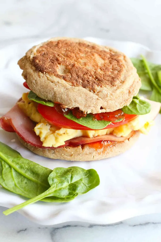 https://www.midlifehealthyliving.com/wp-content/uploads/2021/05/English-Muffin-Breakfast-Sandwich-Recipe-Pepper-Jelly-Cookin-Canuck-3-scaled-1.jpg.webp