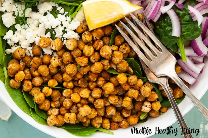 The ww roasted chickpeas on a salad ready to eat. 