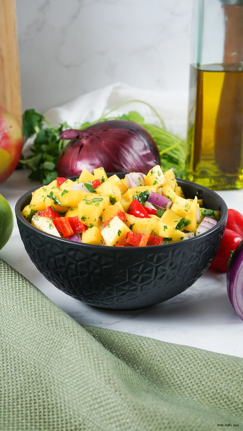 a bowl of the weight watchers mango salsa ready to eat. 