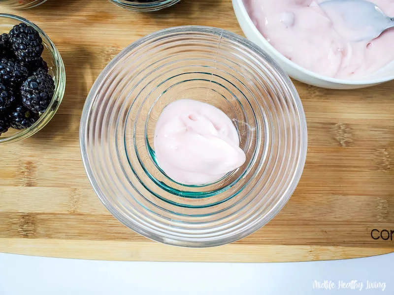 yogurt in the bottom of the trifle bowl.
