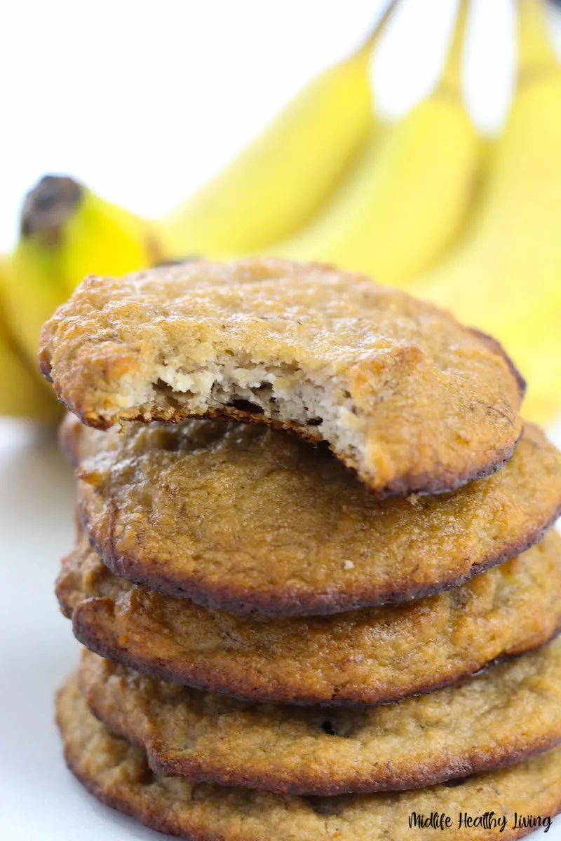 Finished recipe for banana cookies with bite out of one. 