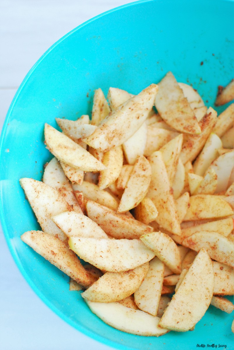 Filling in a large bowl ready for the apple crisp. 