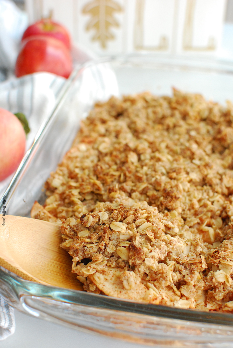 A scoop of the finished apple crisp ready to serve. 