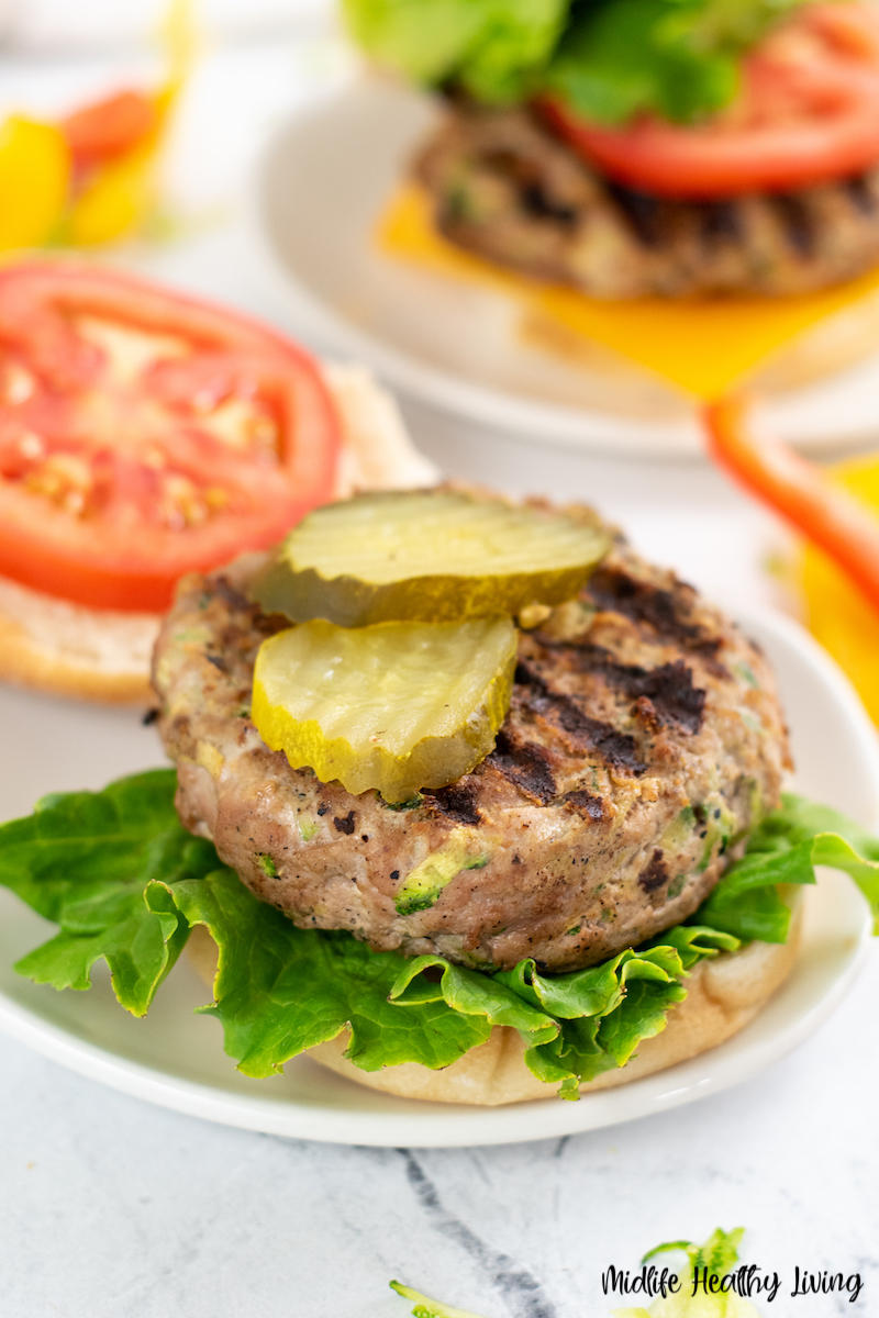 Here we see pickle slices on top of the finished weight watchers turkey burgers. 