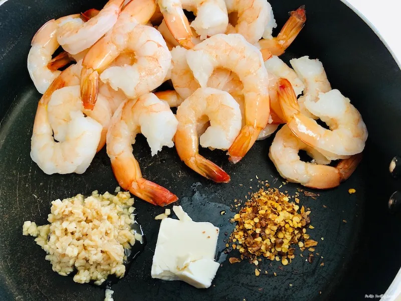 Ingredients for the first step in the pan ready to be cooked.