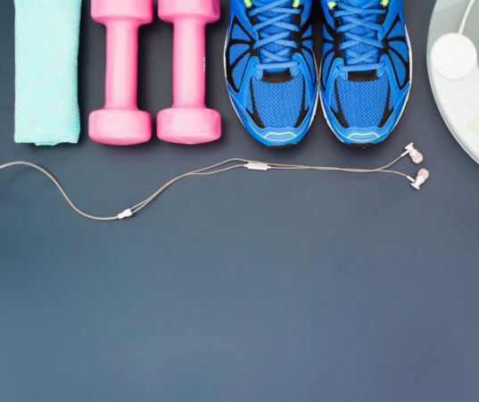 workout gear with shoes and earphones