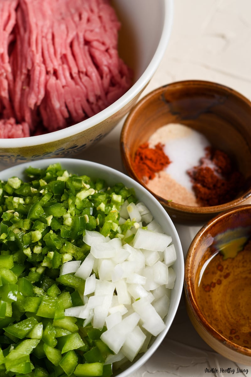 Ingredients to making ground turkey burritos for weight watchers.
