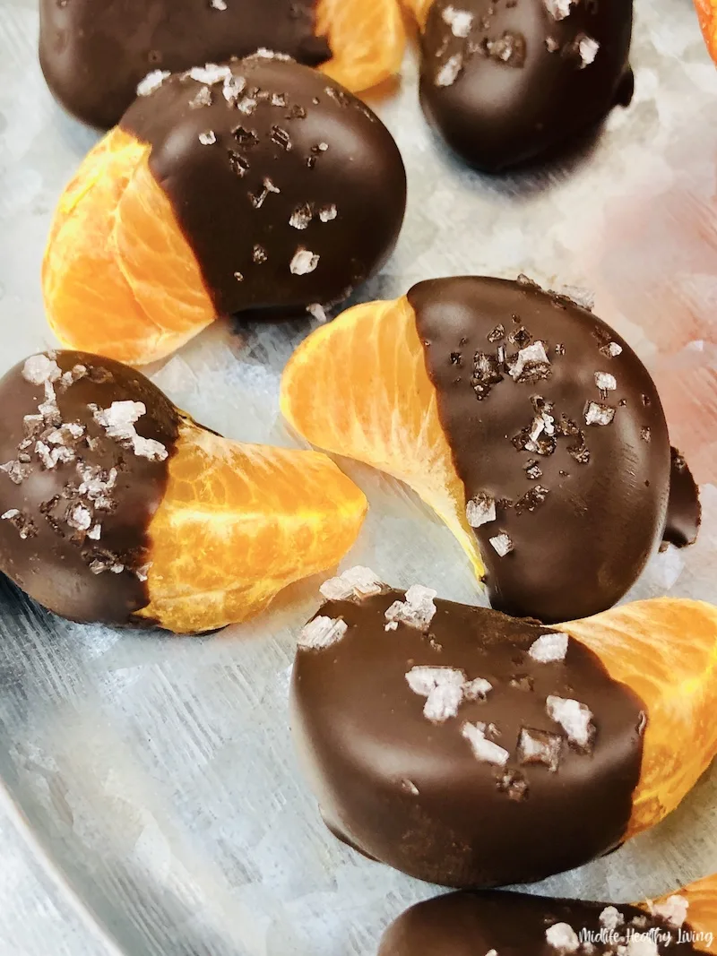 a variety of finished orange slices covered chocolate ready to enjoy