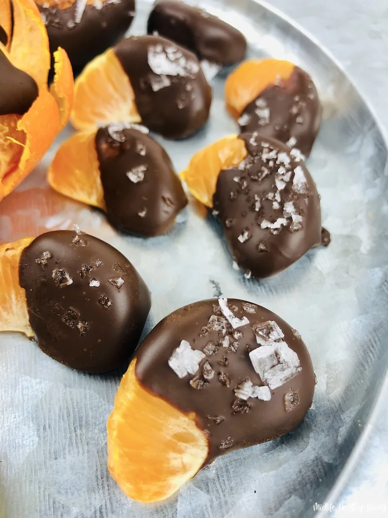 some finished chocolate covered orange slices ready to serve