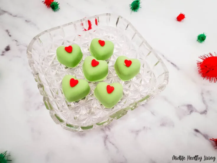 Featured image showing the finished grinch almond butter candy ready to eat.