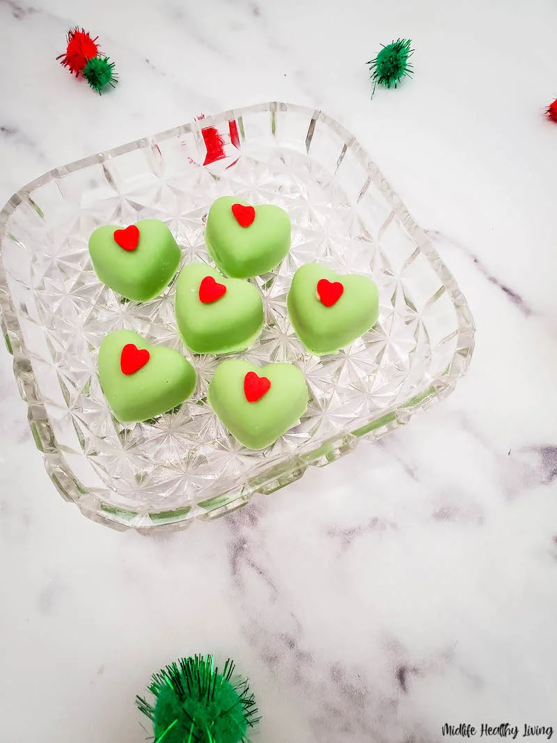 cute grinch almond butter cups ready to eat