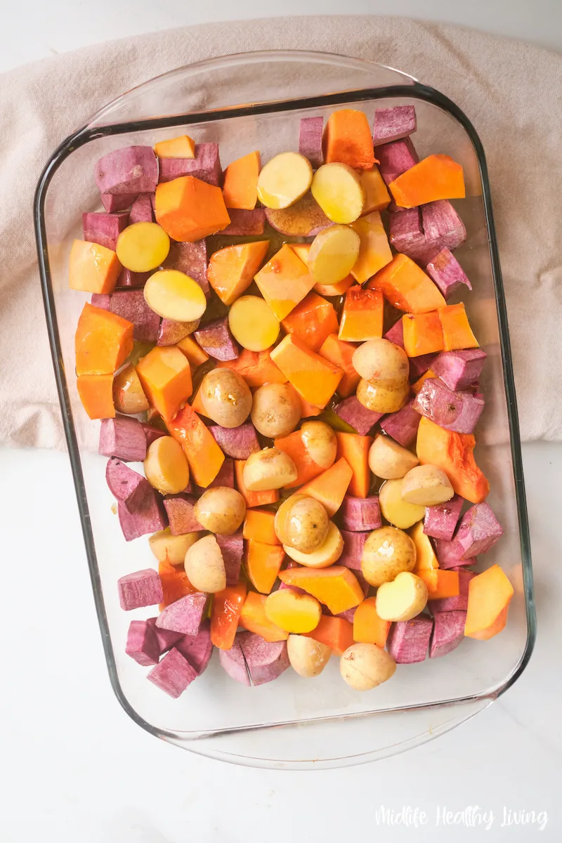 potatoes in the pan ready to be roasted.