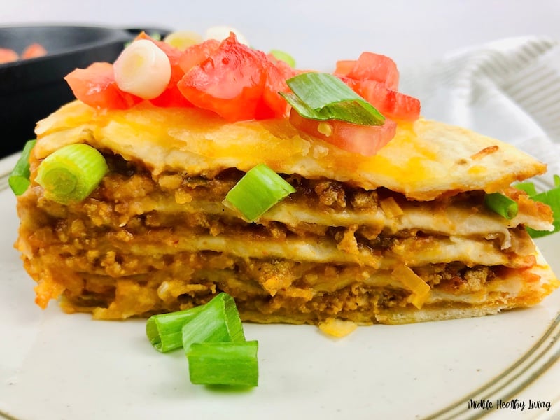 featured image showing finished weight watchers taco pie on a plate ready to eat.