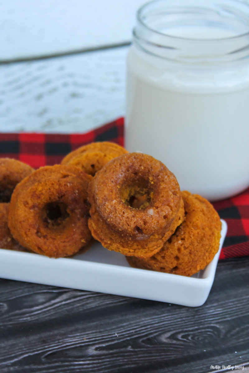 a close up view of the finished baked pumpkin donuts 