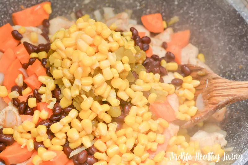 adding all the ingredients to the skillet