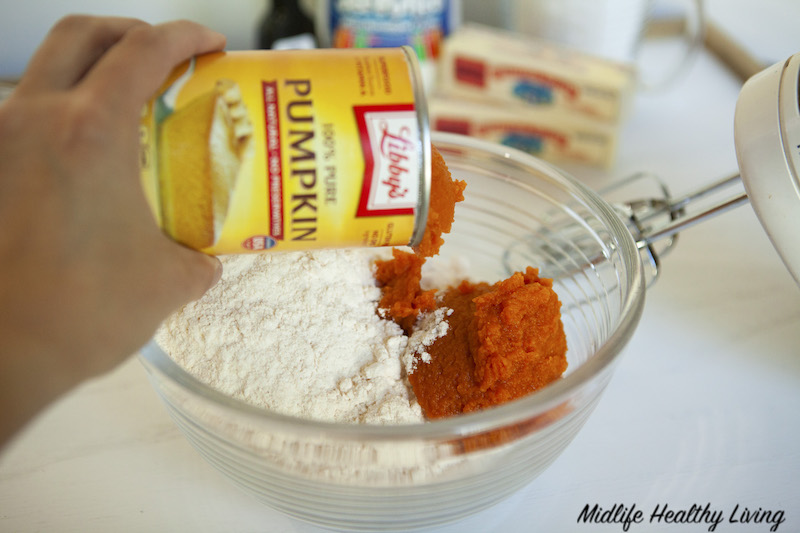 adding pumpkin to the batter for the whoopie pie cakes
