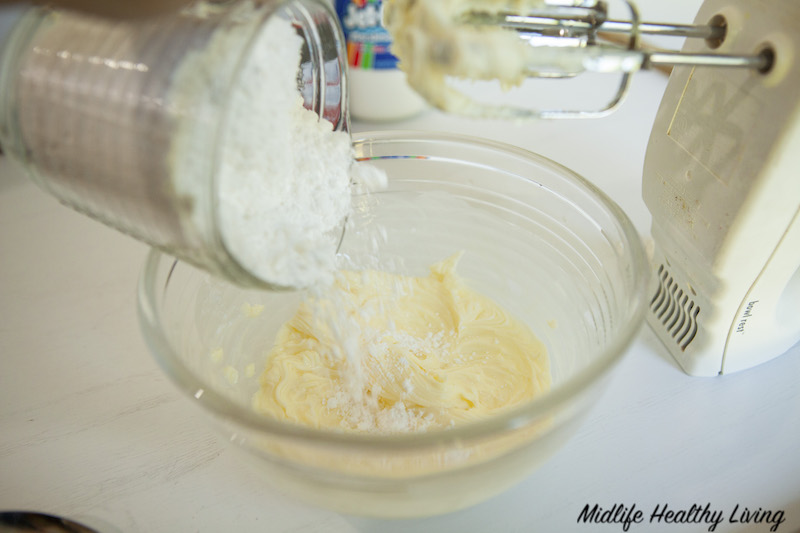 adding butter and sugar to bowl for filling