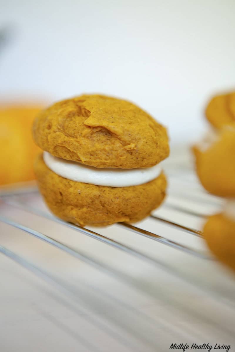 close up view of the finished pumpkin whoopie pie recipe. 