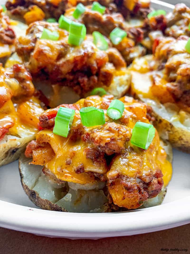 close up finished ground turkey stuffed potato skins ready to eat