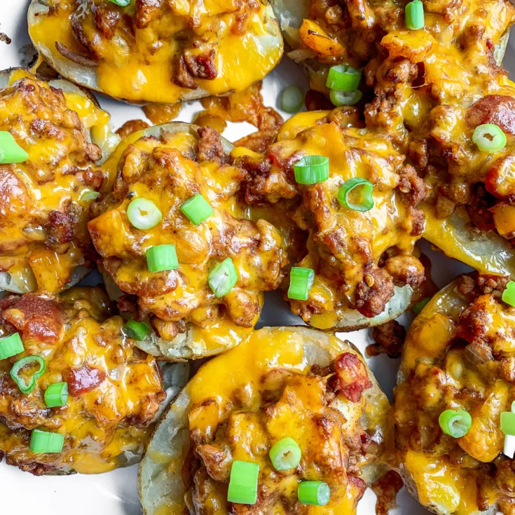 Featured image showing the finished ground turkey stuffed potato skins ready to serve