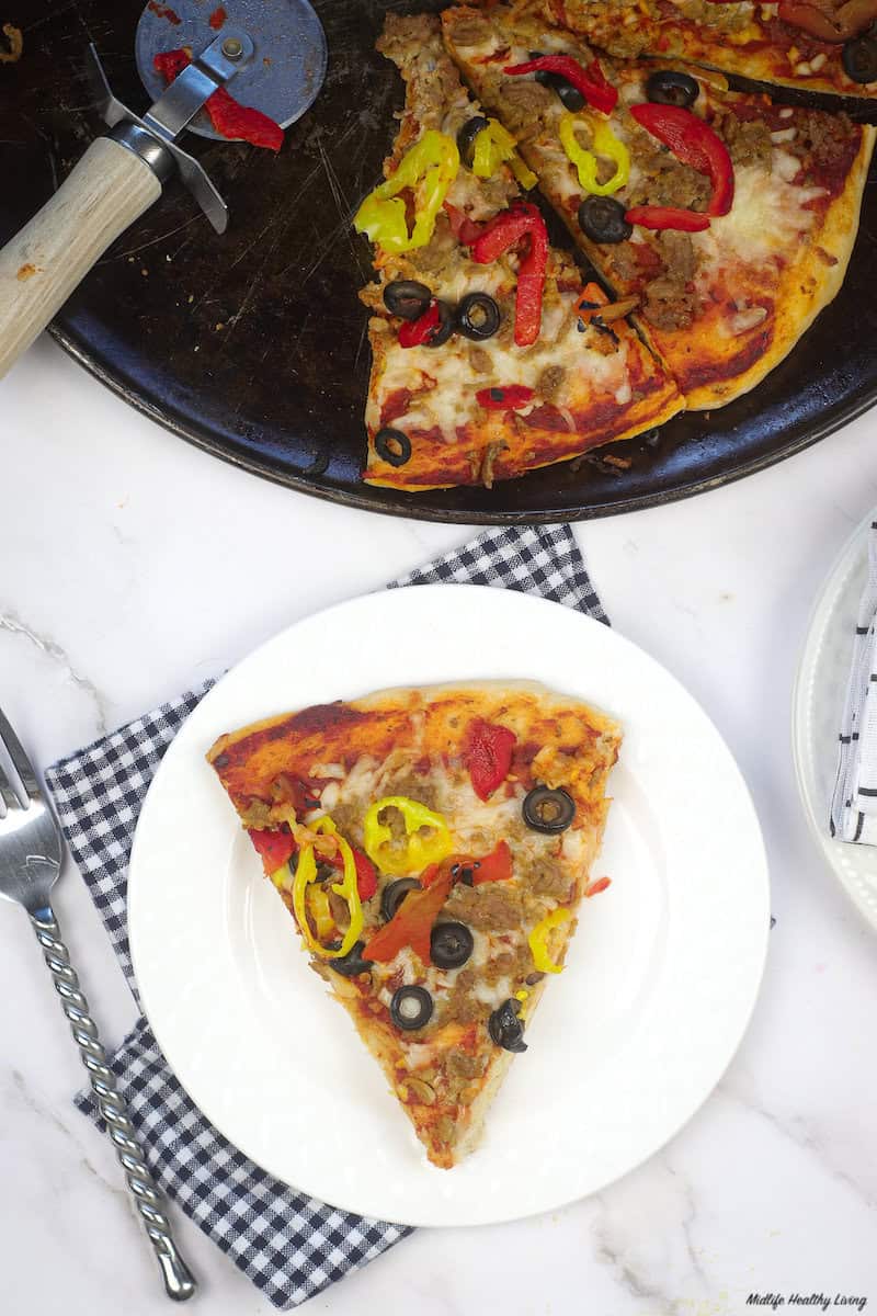 Another look at a slice of the finished ground turkey pizza on a plate ready to eat. 