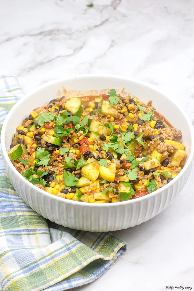 image of the finished ground turkey skillet with zucchini in a serving bowl ready to share