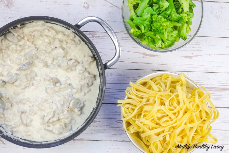 adding the pasta and the veggies. 