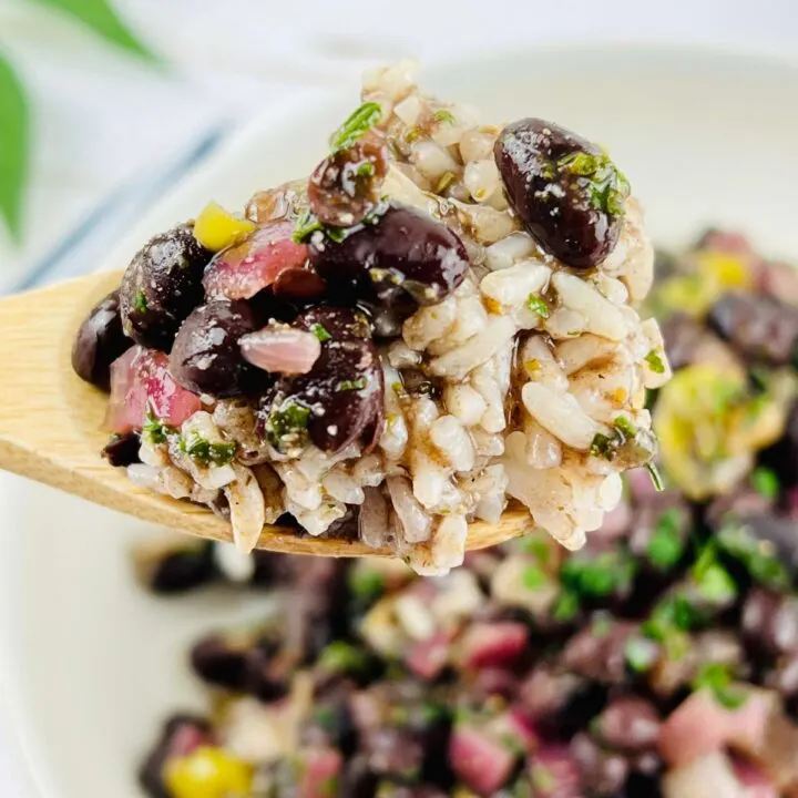 rice for fish tacos on a spoon