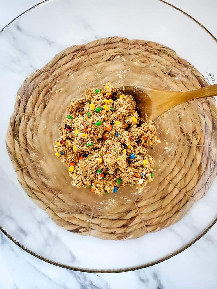 Overview of ingredients being combined in clear mixing bowl.