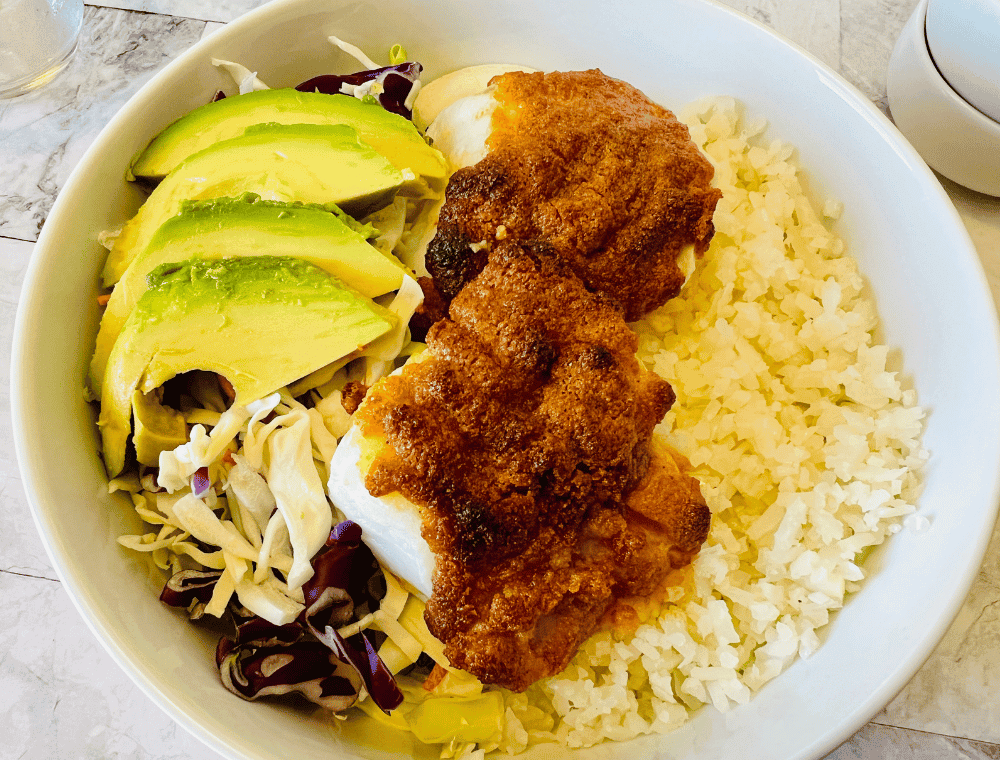 coleslaw and fish with greek yogurt dressing for low carb fish taco bowl