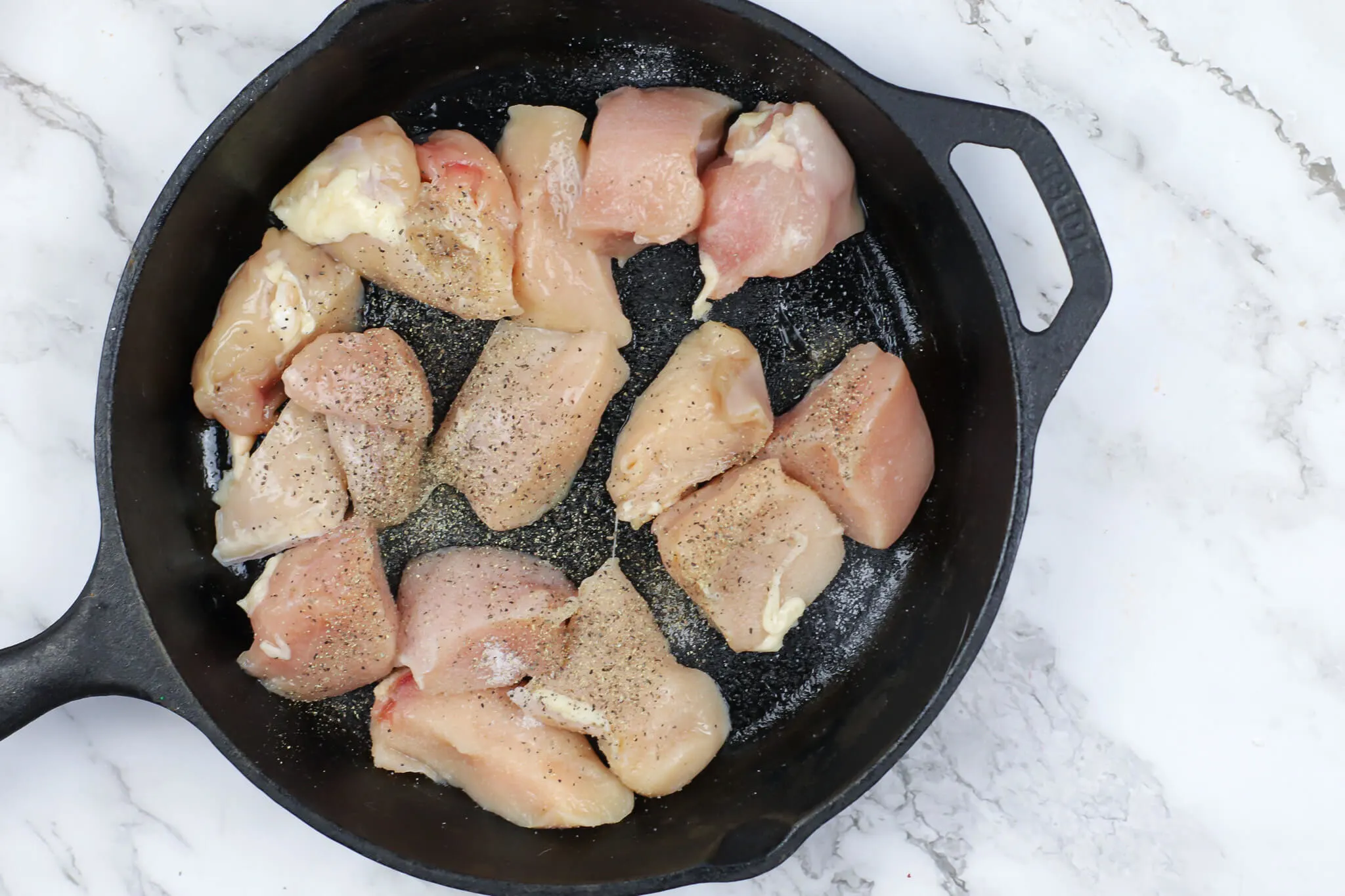 raw chicken with seasoning for skillet chicken potato recipe