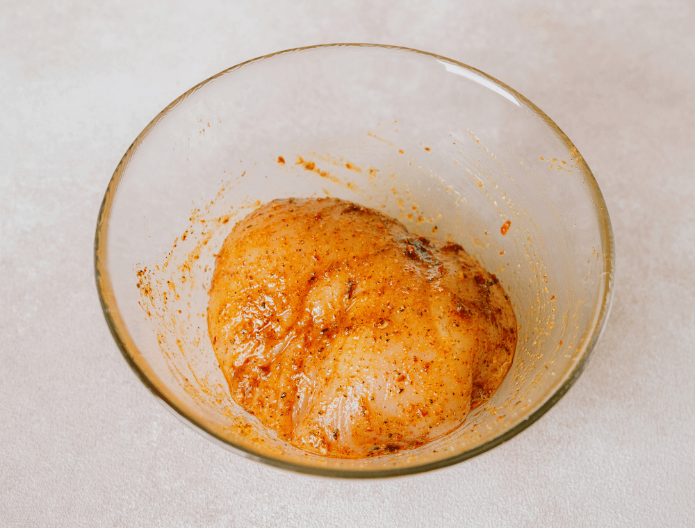 marinated chicken in bowl for ww chicken burrito bowl