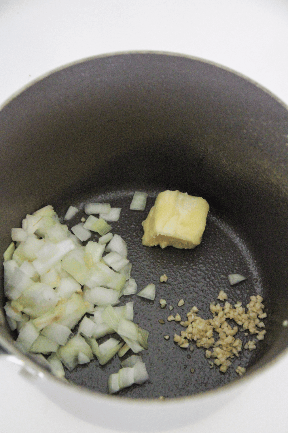 frying butter, onions and garlic for making ww chicken pot pie