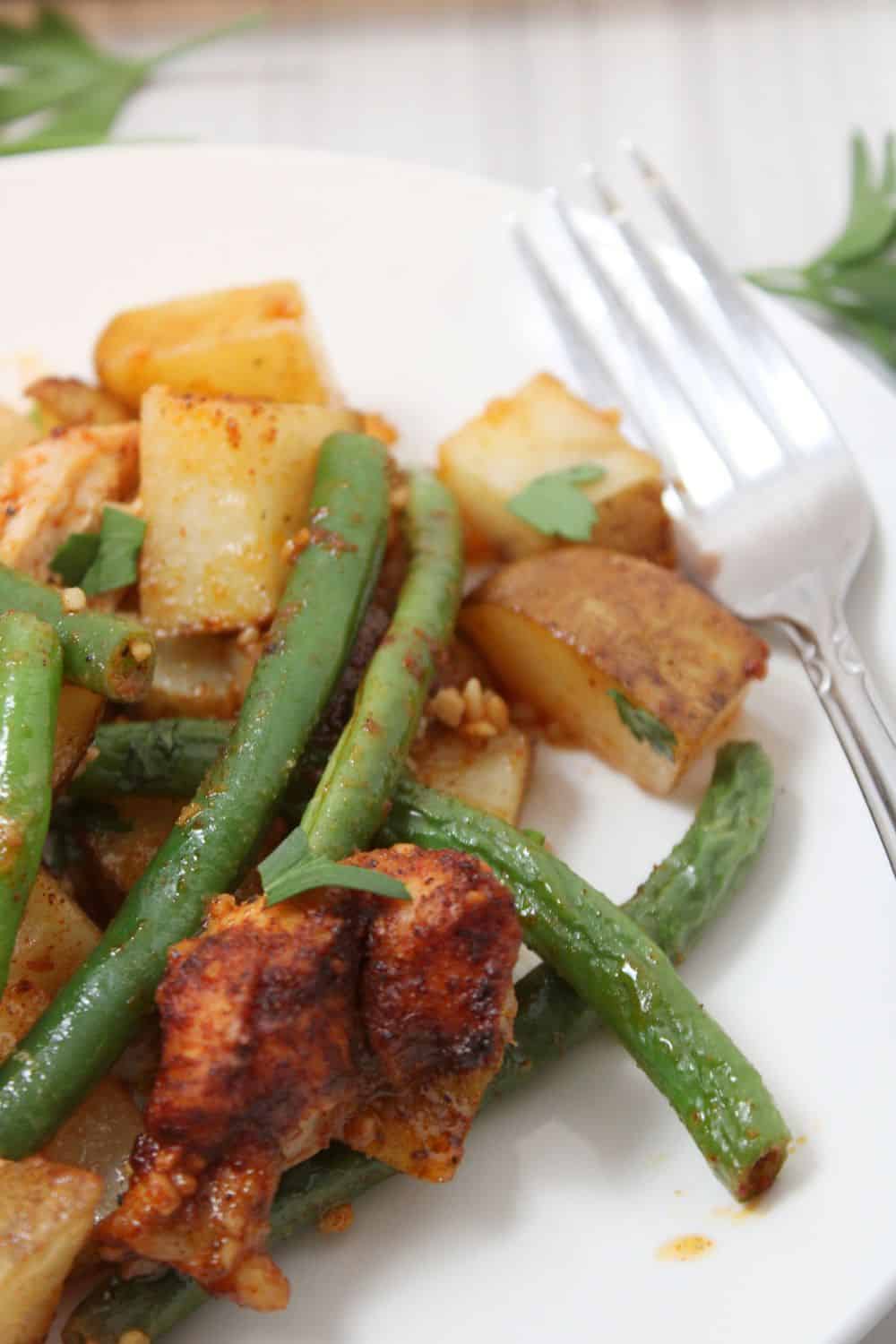 Sheet Pan Chicken Veggies served on a plate