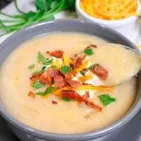 up close shot of Weight Watchers potato soup in a bowl with a spoon