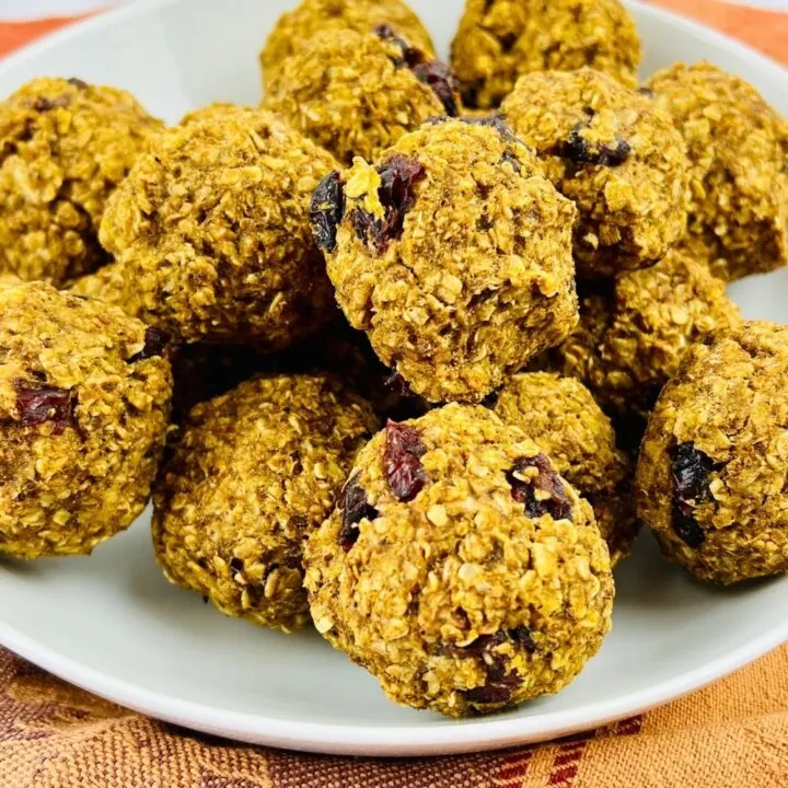 weight watchers pumpkin cookies on a plate with an orange dishtowel backdrop
