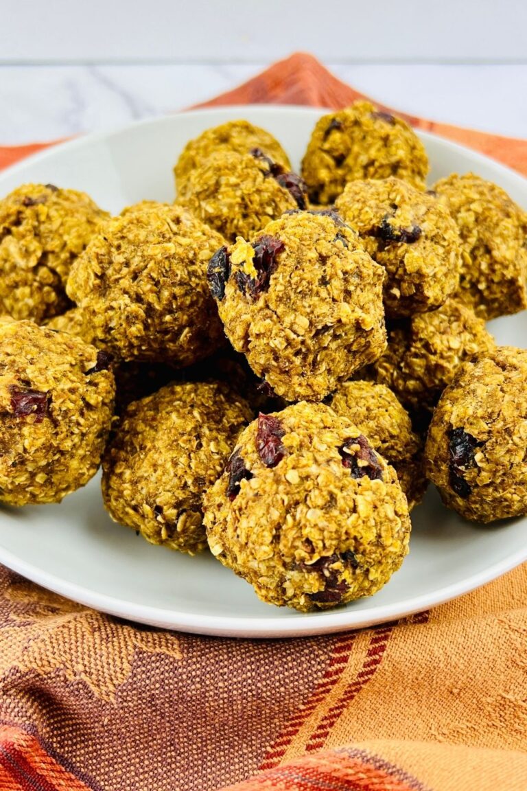 weight watchers pumpkin cookies on a plate with an orange dishtowel backdrop