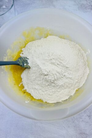 flour being added to the wet ingredients