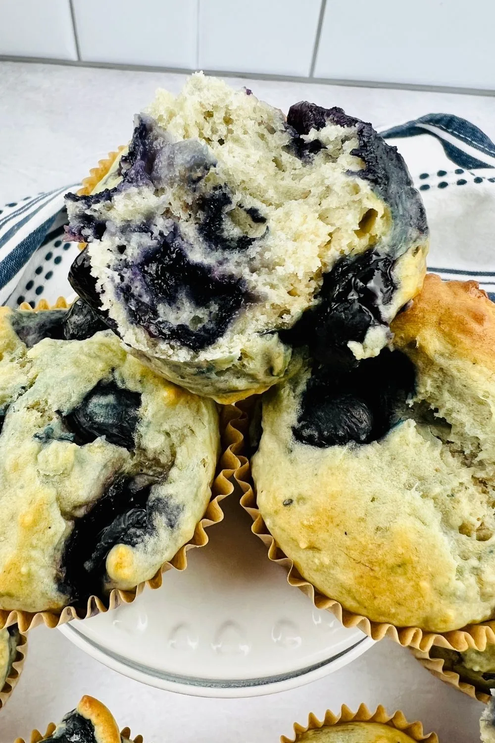 Up close texture shot of the inside of a blueberry muffin