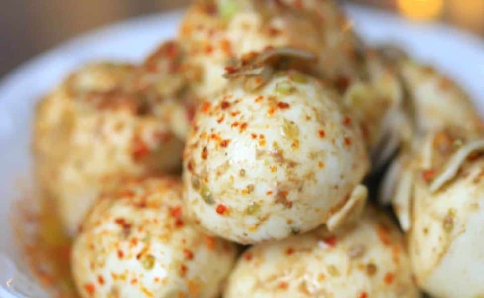  A bowl of marinated mozzarella balls.