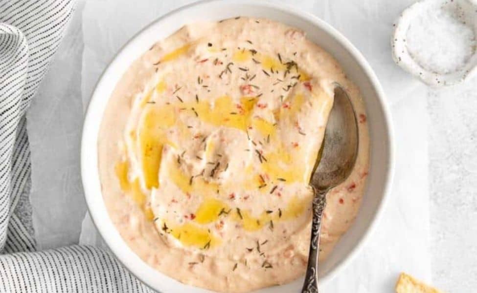  A bowl of creamy red pepper feta dip.