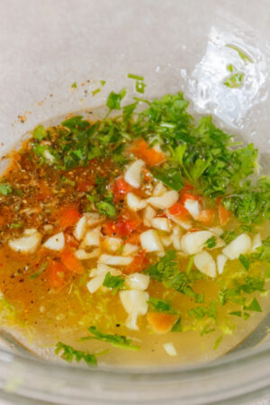 mixing marinade ingredients in a bowl